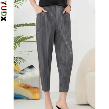 YUDX Miyake 2024 Летние Новые повседневные плиссированные брюки в женском модном стиле с эластичной резинкой на талии, свободные укороченные брюки с карманами